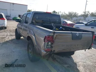 2004 Nissan Frontier XE z VIN 1N6ED27T84C446582, wystawiony jako IAAI lot #41428931 z przebiegiem Nie podano mil oraz . Historia ofert i sprzedaży dostępna na DreamBid. Obrazek 3.