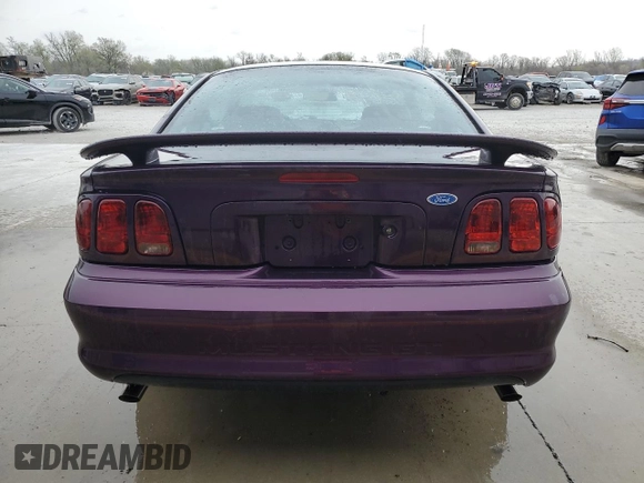 1996 Ford Mustang GT z VIN 1FALP42X8TF196321, wystawiony jako Copart lot #50874885 z przebiegiem 86 945 mil mil oraz Szkoda całkowita • Salvage title. Historia ofert i sprzedaży dostępna na DreamBid. Obrazek 6.