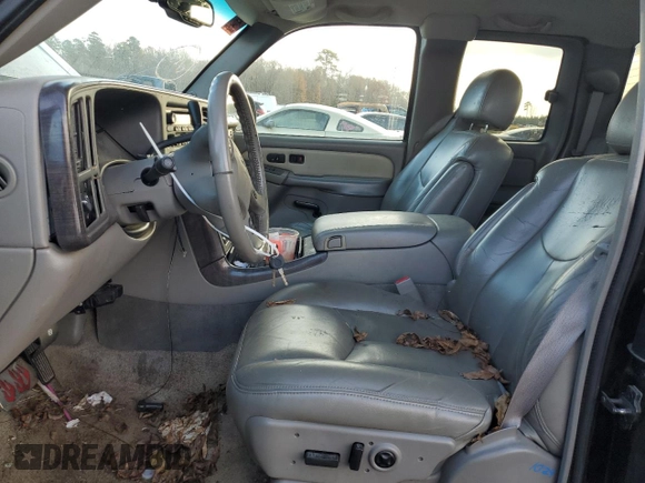 2003 GMC Sierra Denali z VIN 2GTFK69U031261036, wystawiony jako Copart lot #75353324 z przebiegiem 192 762 mil mil oraz Szkody całkowita. Historia ofert i sprzedaży dostępna na DreamBid. Obrazek 7.