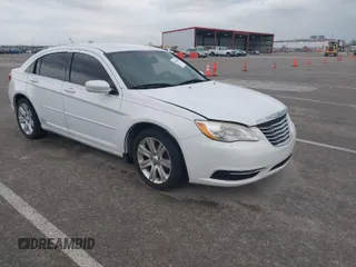 2012 Chrysler 200 LX with VIN 1C3CCBAGXCN240602, listed as a IAAI auction lot 42003604 with 158,040 mi miles and . Bid and sale history available at DreamBid. Image 1.