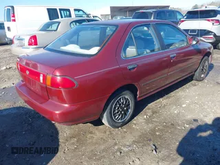 1996 Nissan Sentra XE z VIN 1N4AB41D7TC770549, wystawiony jako IAAI lot #41160561 z przebiegiem 180 485 mil mil oraz . Historia ofert i sprzedaży dostępna na DreamBid. Obrazek 4.