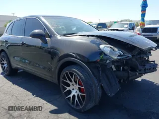 2014 Porsche Cayenne with VIN WP1AA2A23ELA09728, listed as a IAAI auction lot 42289887 with 153,533 mi miles and . Bid and sale history available at DreamBid. Image 1.