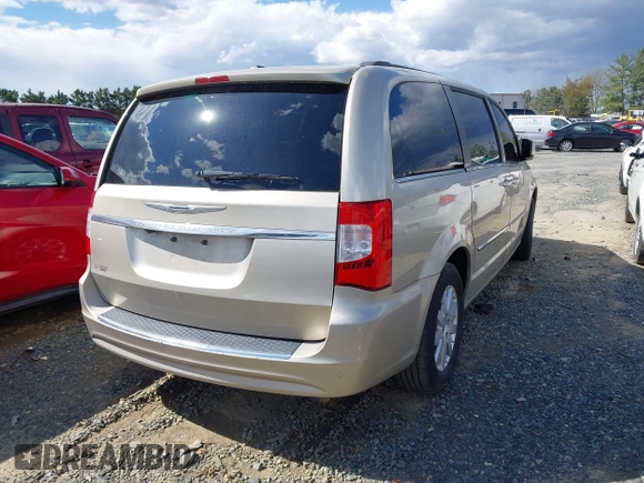 2013 Chrysler Town & Country Touring with VIN 2C4RC1BG8DR559824, listed as a IAAI auction lot 41818237 with 211,248 mi miles. Bid and sale history available at carsss.com. Image 4.