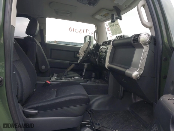 2014 Toyota FJ Cruiser with VIN JTEBU4BF1EK203587, listed as a IAAI auction lot 41978010 with 62,438 mi miles. Bid and sale history available at carsss.com. Image 5.