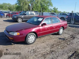 1996 Toyota Camry DX z VIN JT2BG12K4T0363844, wystawiony jako IAAI lot #42215996 z przebiegiem 214 452 mil mil oraz . Historia ofert i sprzedaży dostępna na DreamBid. Obrazek 2.