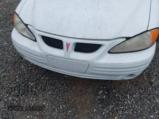 1999 Pontiac Grand Am SE1 with VIN 1G2NE52EXXM781713, listed as a IAAI auction lot 41914492 with 148,435 mi miles. Bid and sale history available at carsss.com. Image 6.