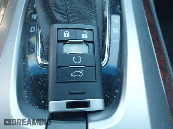 2011 Cadillac CTS Premium with VIN 1G6DP1ED6B0135939, listed as a IAAI auction lot 42082154 with 85,026 mi miles and . Bid and sale history available at carsss.com. Image 11.