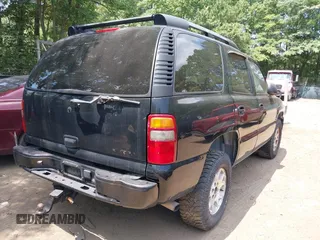 2003 Chevrolet Tahoe Z71 with VIN 1GNEK13T23R213938, listed as a IAAI auction lot 42603485 with 249,246 mi miles and . Bid and sale history available at DreamBid. Image 4.