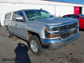 2018 Chevrolet Silverado 1500 LT with VIN 1GCVKREC0JZ157855, listed as a IAAI auction lot 41033669 with 127,315 mi miles. Bid and sale history available at carsss.com. Image 1.