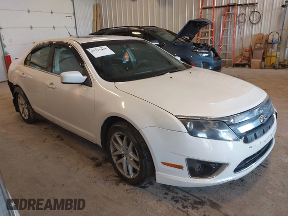 2012 Ford Fusion SEL with VIN 3FAHP0JGXCR128976, listed as a IAAI auction lot 41721468 with 115,277 mi miles. Bid and sale history available at carsss.com. Image 1.