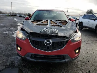 2014 Mazda CX-5 Touring с VIN JM3KE2CY3E0308740, выставлен на аукционе Copart как лот 88127365 с пробегом 137 690 миль миль и Списание • Salvage title. История ставок и продаж доступна на DreamBid. Изображение 5.
