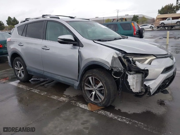 2016 Toyota RAV4 XLE with VIN 2T3WFREV7GW251931, listed as a IAAI auction lot 41906274 with 55,700 mi miles. Bid and sale history available at carsss.com. Image 1.