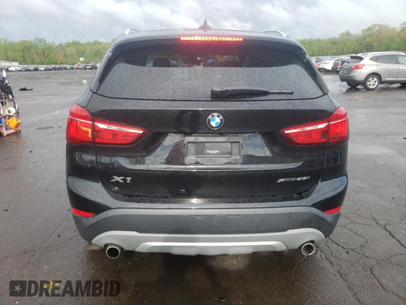 2018 BMW X1 xDrive28i with VIN WBXHT3C35J3H30946, listed as a Copart auction lot 55927505 with 69,626 mi miles and Salvage title. Bid and sale history available at DreamBid. Image 6.