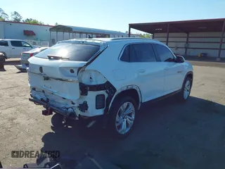 2021 Volkswagen Atlas SEL z VIN 1V2EE2CA2MC227667, wystawiony jako IAAI lot #41886405 z przebiegiem 41 928 mil mil oraz . Historia ofert i sprzedaży dostępna na DreamBid. Obrazek 4.