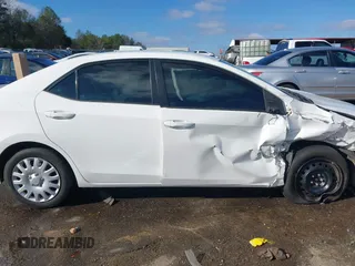 2016 Toyota Corolla L z VIN 2T1BURHE9GC518514, wystawiony jako IAAI lot #41286825 z przebiegiem 144 579 mil mil oraz . Historia ofert i sprzedaży dostępna na DreamBid. Obrazek 14.