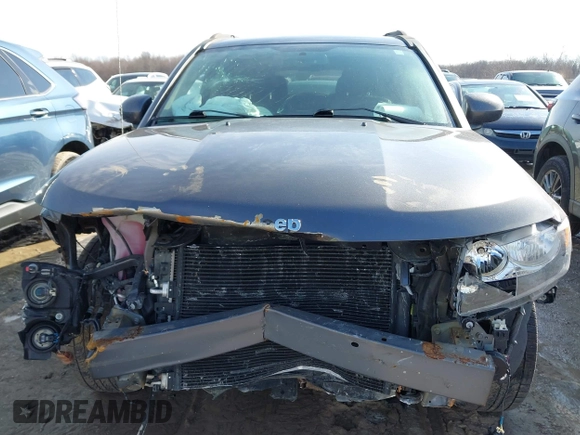 2017 Jeep Compass Latitude with VIN 1C4NJDEB0HD190200, listed as a IAAI auction lot 41733462 with 77,374 mi miles and . Bid and sale history available at DreamBid. Image 6.