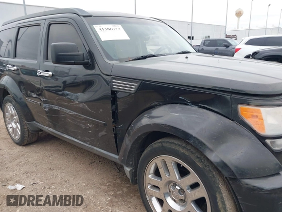 2010 Dodge Nitro SXT z VIN 1D4PT5GK4AW107449, wystawiony jako IAAI lot #41306772 z przebiegiem 174 433 mil mil oraz . Historia ofert i sprzedaży dostępna na DreamBid. Obrazek 6.