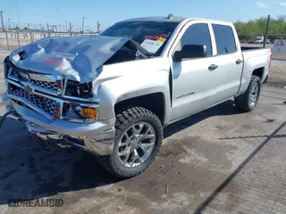 2014 Chevrolet Silverado 1500 LT with VIN 3GCUKREC0EG353893, listed as a IAAI auction lot 41858233 with 187,819 mi miles. Bid and sale history available at carsss.com. Image 2.