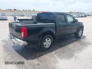 2005 Nissan Frontier LE z VIN 1N6AD07W85C418182, wystawiony jako IAAI lot #42577570 z przebiegiem 204 780 mil mil oraz . Historia ofert i sprzedaży dostępna na DreamBid. Obrazek 4.
