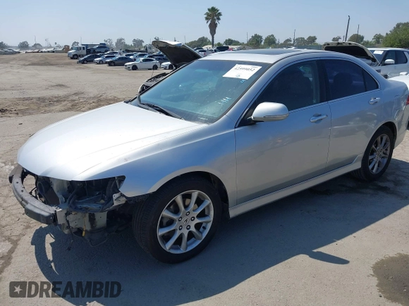 2006 Acura TSX Navi with VIN JH4CL969X6C003492, listed as a IAAI auction lot 42599052 with 121,254 mi miles and . Bid and sale history available at DreamBid. Image 2.