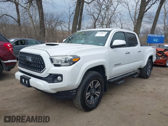 2018 Toyota Tacoma SR5 with VIN 3TMDZ5BN9JM051105, listed as a IAAI auction lot 41708034 with 98,000 mi miles and . Bid and sale history available at DreamBid. Image 17.
