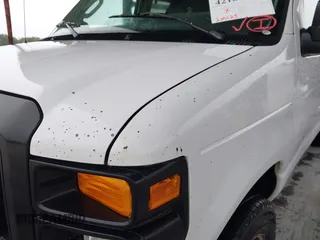 2011 Ford Econoline Cargo Commercial with VIN 1FTNE2EL5BDB35198, listed as a IAAI auction lot 42181448 with 205,128 mi miles and . Bid and sale history available at DreamBid. Image 6.