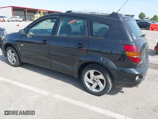 2004 Pontiac Vibe with VIN 5Y2SL62824Z401279, listed as a IAAI auction lot 42111585 with 184,200 mi miles. Bid and sale history available at carsss.com. Image 3.