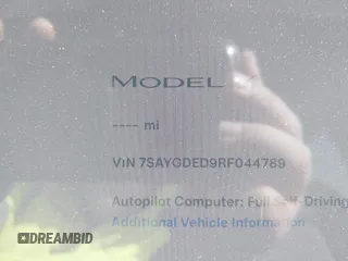 2024 Tesla Model Y with VIN 7SAYGDED9RF044789, listed as a IAAI auction lot 41817318 with Not Provided miles and . Bid and sale history available at carsss.com. Image 7.