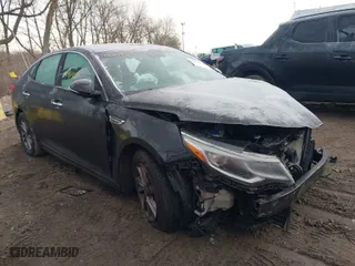 2020 Kia Optima LX with VIN 5XXGT4L33LG384944, listed as a IAAI auction lot 41464556 with 116,412 mi miles. Bid and sale history available at carsss.com. Image 1.
