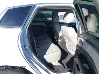 2015 Cadillac SRX with VIN 3GYFNAE34FS557297, listed as a IAAI auction lot 41388573 with 124,185 mi miles and . Bid and sale history available at DreamBid. Image 8.