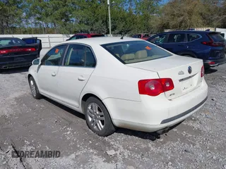 2007 Volkswagen Jetta Wolfsburg Edition z VIN 3VWEF71K77M077224, wystawiony jako IAAI lot #41762803 z przebiegiem Nie podano mil oraz . Historia ofert i sprzedaży dostępna na DreamBid. Obrazek 3.
