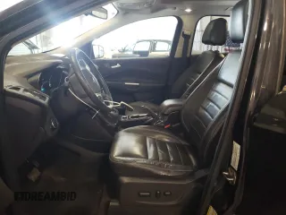 2014 Ford Escape Titanium with VIN 1FMCU9J9XEUE45988, listed as a Copart auction lot 56066175 with 228,872 mi miles and Clean Title. Bid and sale history available at DreamBid. Image 7.
