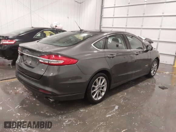 2018 Ford Fusion Energi SE with VIN 3FA6P0PU3JR203714, listed as a IAAI auction lot 41698507 with 168,609 mi miles. Bid and sale history available at carsss.com. Image 4.