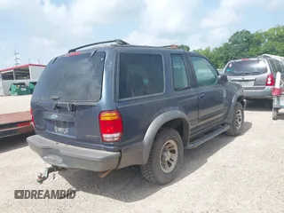 1999 Ford Explorer Sport z VIN 1FMYU22X1XUB45978, wystawiony jako IAAI lot #42631114 z przebiegiem 206 634 mil mil oraz . Historia ofert i sprzedaży dostępna na DreamBid. Obrazek 4.
