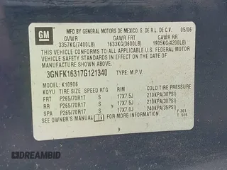 2007 Chevrolet Suburban LTZ z VIN 3GNFK16317G121340, wystawiony jako IAAI lot #42318373 z przebiegiem 176 953 mil mil oraz . Historia ofert i sprzedaży dostępna na DreamBid. Obrazek 9.