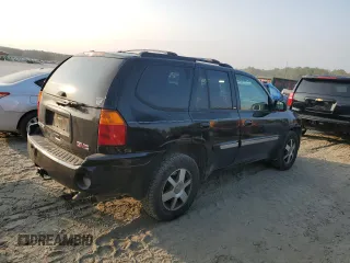 2004 GMC Envoy SLT with VIN 1GKDT13S942407244, listed as a Copart auction lot 70995064 with 162,676 mi miles and Salvage Title. Bid and sale history available at carsss.com. Image 3.