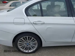 2012 BMW 3 Series 328i with VIN WBA3A5C56CF340427, listed as a IAAI auction lot 42246689 with 149,419 mi miles and . Bid and sale history available at DreamBid. Image 6.