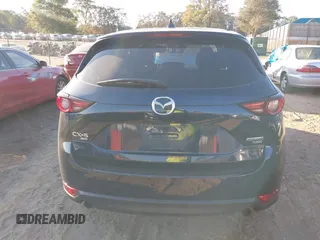 2021 Mazda CX-5 Grand Touring Reserve with VIN JM3KFBAYXM0465762, listed as a IAAI auction lot 40728368 with 30,667 mi miles. Bid and sale history available at carsss.com. Image 16.