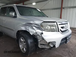 2011 Honda Pilot Touring with VIN 5FNYF4H90BB084692, listed as a IAAI auction lot 41867622 with 62,805 mi miles. Bid and sale history available at carsss.com. Image 6.