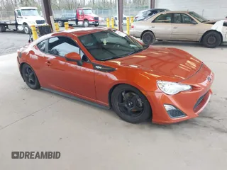 2015 Scion FR-S with VIN JF1ZNAA17F8703357, listed as a IAAI auction lot 41924644 with 62,023 mi miles. Bid and sale history available at carsss.com. Image 1.