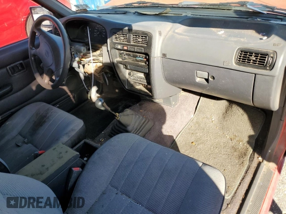 1994 Nissan Frontier XE z VIN 1N6SD16S6RC376979, wystawiony jako Copart lot #45375355 z przebiegiem 271 128 mil mil oraz Szkoda całkowita • Salvage title. Historia ofert i sprzedaży dostępna na DreamBid. Obrazek 8.