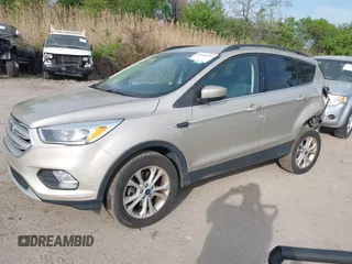 2018 Ford Escape SE z VIN 1FMCU9GD1JUB02119, wystawiony jako IAAI lot #42092393 z przebiegiem 69 309 mil mil oraz . Historia ofert i sprzedaży dostępna na DreamBid. Obrazek 2.