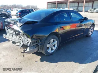 2014 Dodge Charger SE with VIN 2C3CDXBG6EH234509, listed as a IAAI auction lot 41618980 with 152,654 mi miles. Bid and sale history available at carsss.com. Image 4.