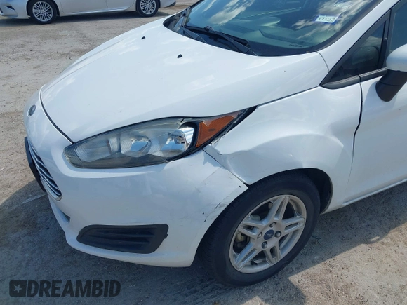 2017 Ford Fiesta SE z VIN 3FADP4BJXHM147290, wystawiony jako IAAI lot #42071340 z przebiegiem 122 142 mil mil oraz . Historia ofert i sprzedaży dostępna na DreamBid. Obrazek 6.
