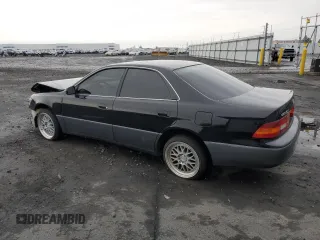 1997 Lexus ES 300 Luxury Sport Sdn with VIN JT8BF22G5V0057703, listed as a Copart auction lot 84712734 with 160,575 mi miles and Salvage Title. Bid and sale history available at carsss.com. Image 2.