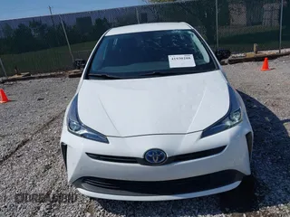 2022 Toyota Prius L Eco with VIN JTDKAMFUXN3159170, listed as a IAAI auction lot 41930288 with 53,414 mi miles and . Bid and sale history available at DreamBid. Image 6.