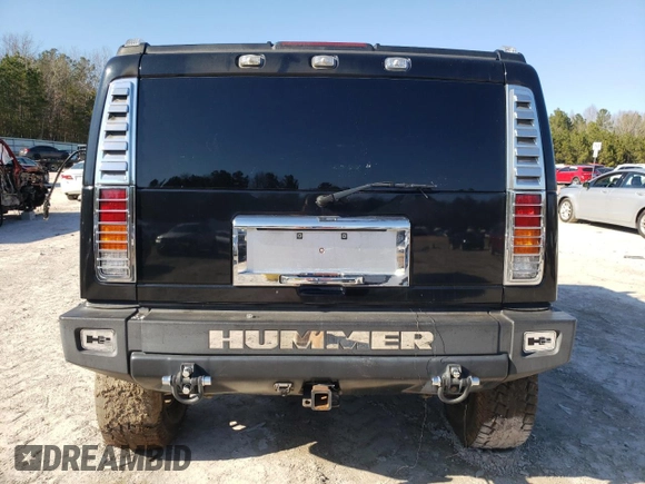 2003 Hummer H2 z VIN 5GRGN23U43H103551, wystawiony jako Copart lot #45456775 z przebiegiem Nie podano mil oraz Nie do naprawy. Historia ofert i sprzedaży dostępna na DreamBid. Obrazek 6.
