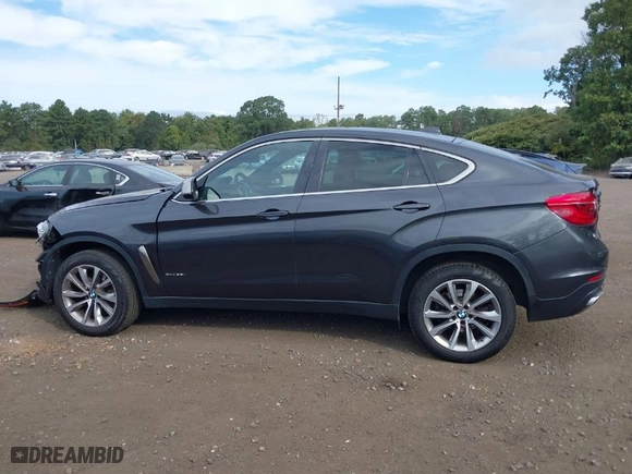 2019 BMW X6 xDrive35i with VIN 5UXKU2C52K0Z63337, listed as a IAAI auction lot 40364520 with 94,015 mi miles. Bid and sale history available at carsss.com. Image 14.