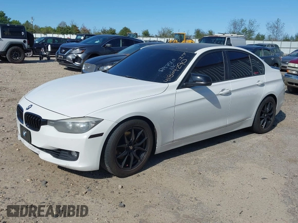 2013 BMW 3 Series 328i with VIN WBA3C1G59DNR47510, listed as a IAAI auction lot 41864290 with 160,585 mi miles. Bid and sale history available at carsss.com. Image 2.