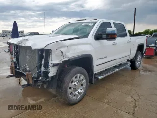 2016 GMC Sierra 2500HD Denali z VIN 1GT12UE86GF209142, wystawiony jako Copart lot #55663215 z przebiegiem 77 382 mil mil oraz Czysty tytuł • Clean title. Historia ofert i sprzedaży dostępna na DreamBid. Obrazek 1.